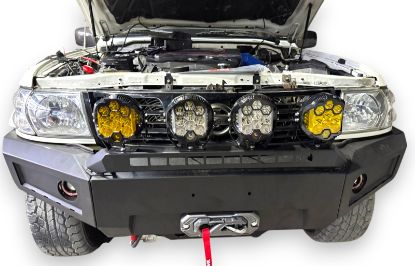 تفاصيل دعامية امامية نيسان فتك Y61 مع لايت صورة دعامية امامية نيسان فتك Y61 مع لايت